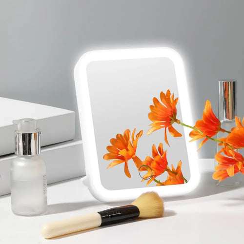 Espelho de Maquiagem LED Dobrável com 3 Níveis de Luz – Portátil e Recarregável!